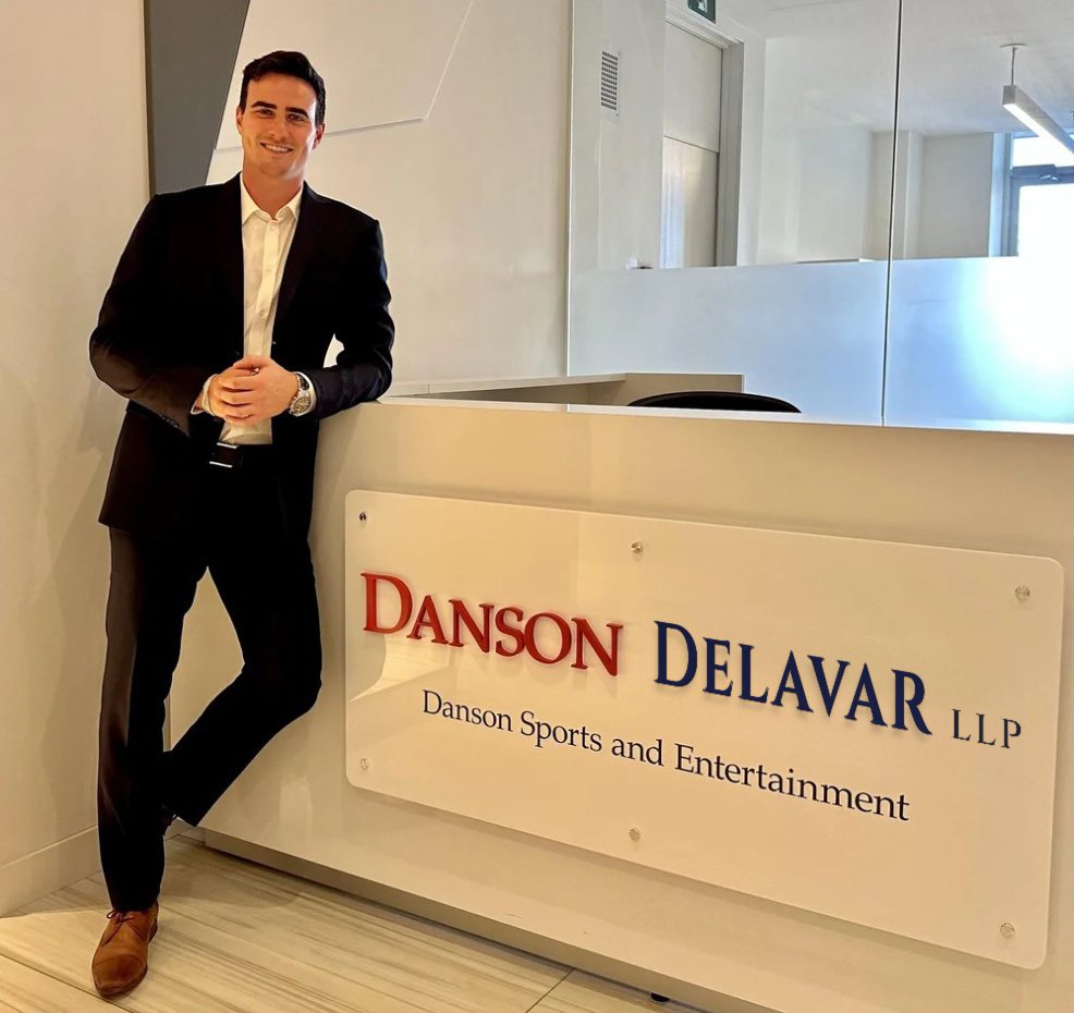 Jake Danson, President of DSE and AdvanceSport Performance, at the Danson Delavar LLP and Danson Sports and Entertainment reception desk