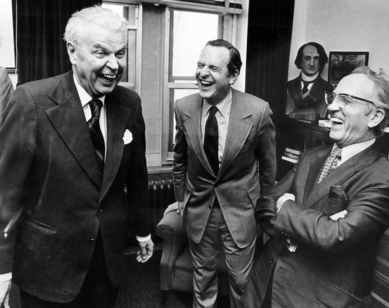 The Right Honourable John Diefenbaker, The Honourable Barnett J. Danson and The Honourable Tommy Douglas sharing a laugh in an office