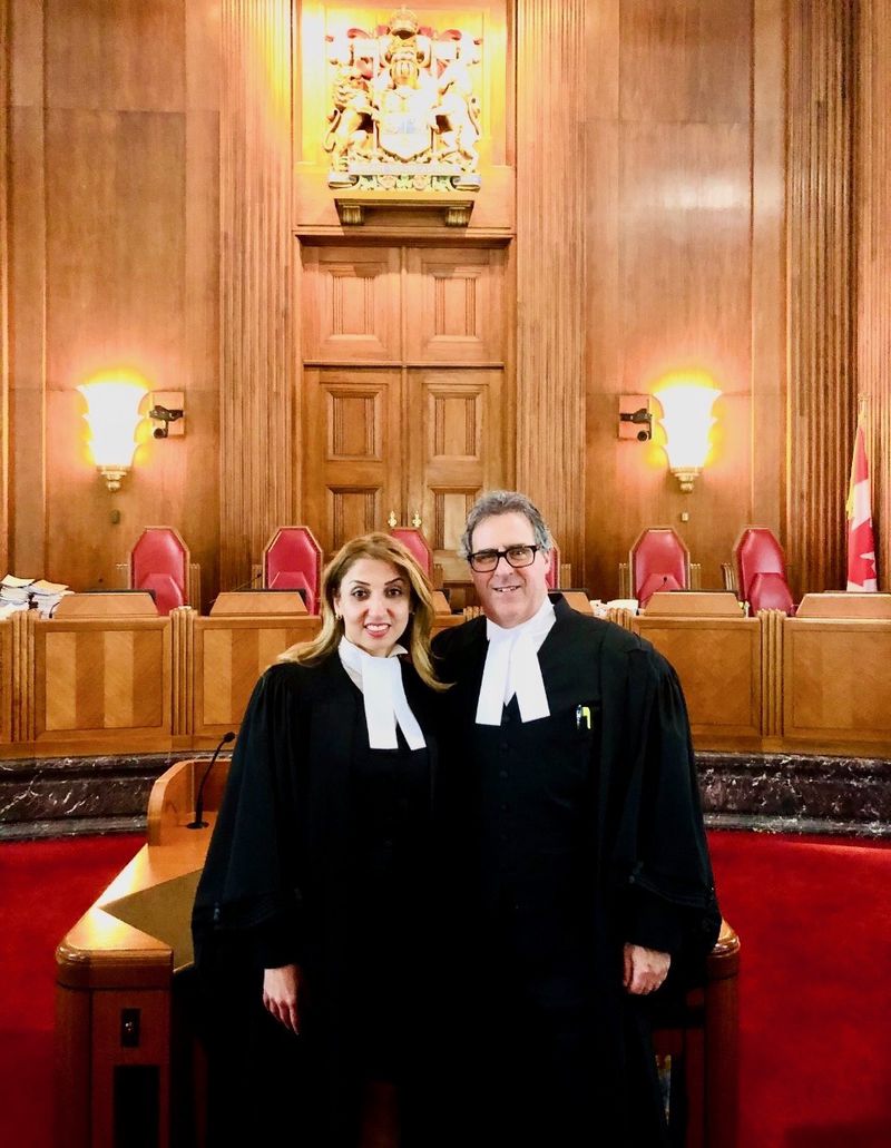 Timothy S.B. Danson with his partner Marjan Delavar, in barrister robes, in the Supreme Court of Canada